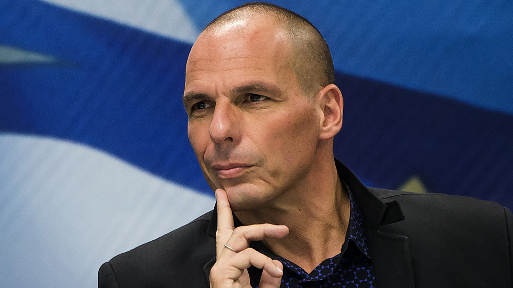 Newly appointed Greek Finance Minister Varoufakis attends a hand over ceremony in Athens
