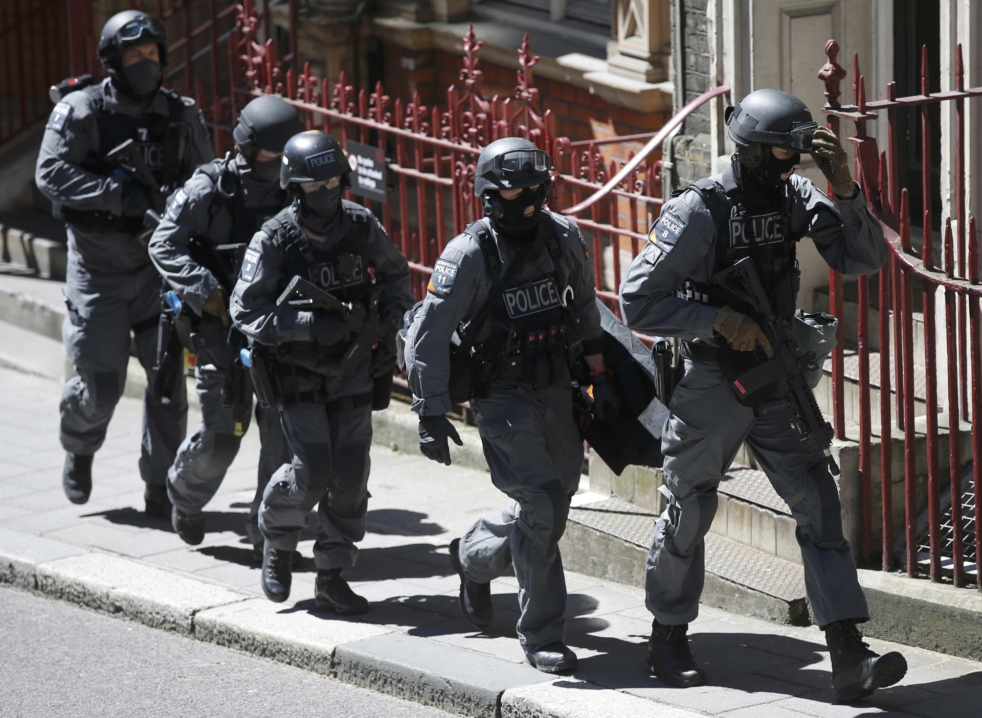London Metropolitan Police take part in a mock terror attack at a disused underground station in central London