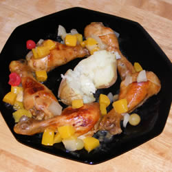 Ricette: pollo con mele e arancia