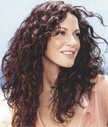 Come prendersi cura dei capelli ricci e lunghi