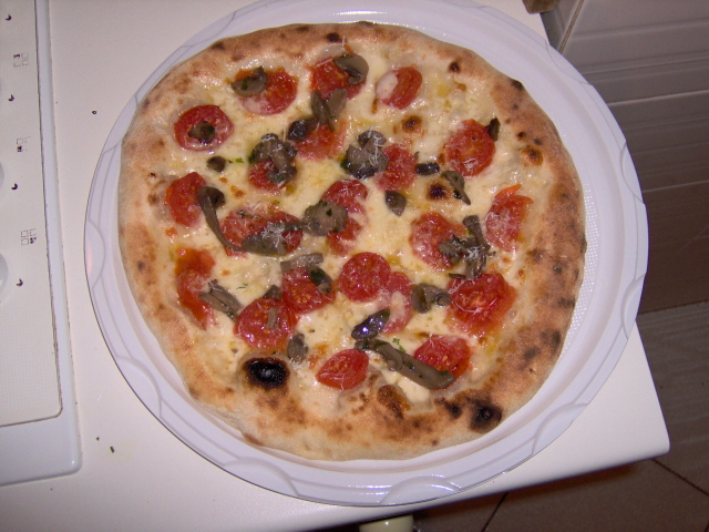 Quanto pesa una pizza Quanto pesa una pizza