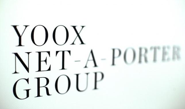 Yoox Net-A-Porter Group placard is seen in Bologna