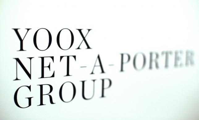 Yoox Net-A-Porter Group placard is seen in Bologna
