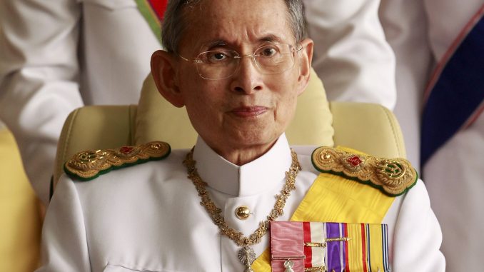 Thailand's King Bhumibol Adulyadej leaving the Siriraj Hospital for a ceremony at the Grand Palace in Bangkok
