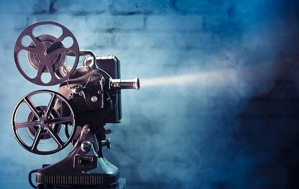 old film projector with dramatic lighting