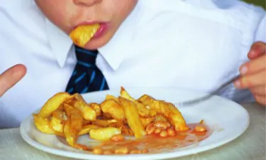 Boy eating a plate of chi 007