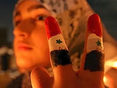 siria donna protesta xin 400x300