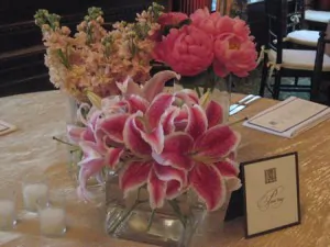 Wedding centerpiece with Stargazer Lilies coral peonies