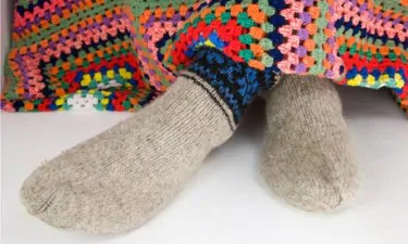 Feet in woollen knitted s 009