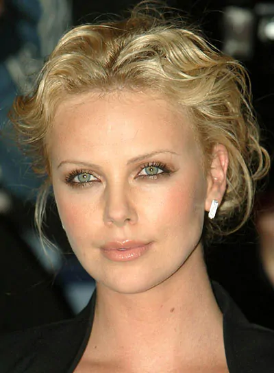 charlize theron curly updo sexy