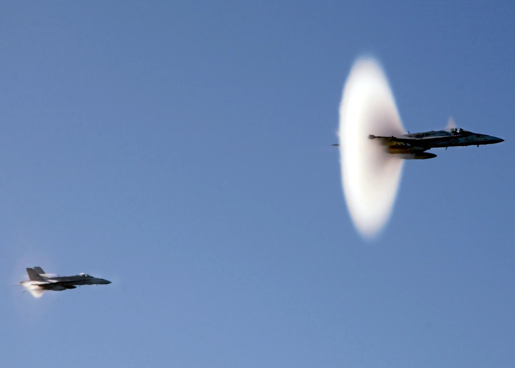Supersonic aircraft breaking sound barrier