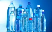 10534717 group plastic bottles of water on blue background
