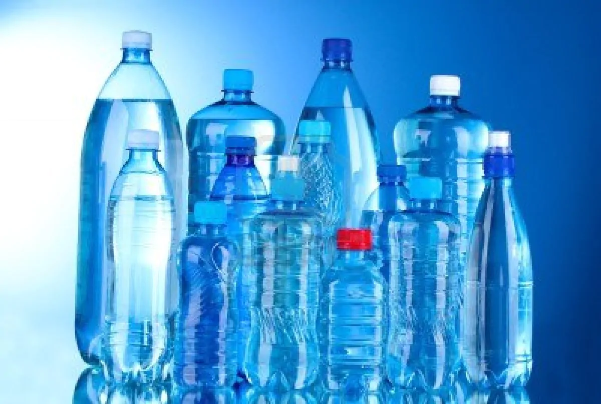 10534717 group plastic bottles of water on blue background
