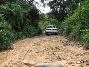 1986 1991 Toyota Camry sedan on road to Bokor Hill Station Cambodia