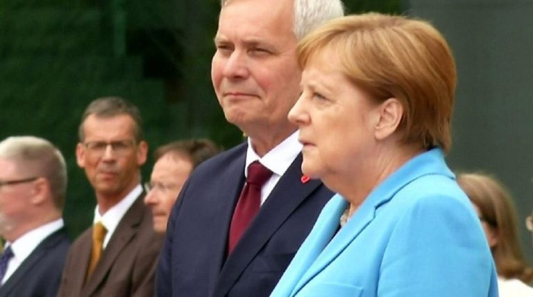 angela merkel tremore