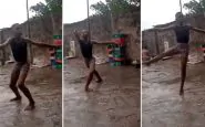 bambino che balla sotto la pioggia