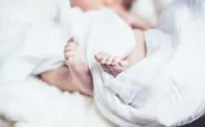 Coronavirus neonata contagiata battesimo
