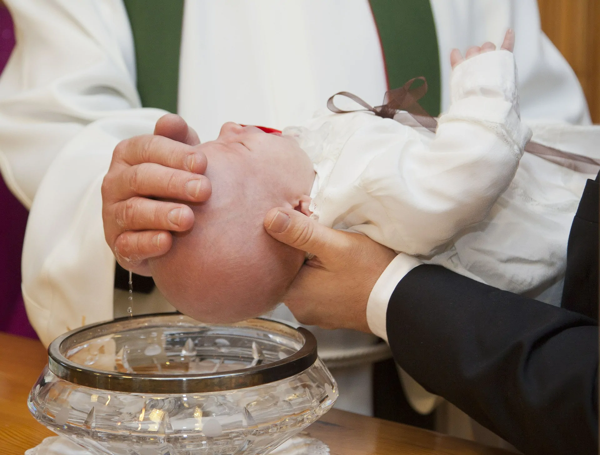 Rissa al battesimo