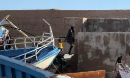 Migranti in sbarco a Lampedusa