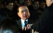 Silvio Berlusconi sanguinante dopo l'attentato di Tartaglia