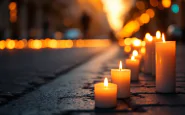Corteo commemorativo per Ramy Elgaml con fiaccole accese