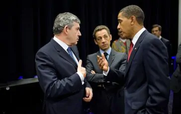 president barack obama talks with british prime minister gordon brown and french president nicolas sarkozy prior to making a statement about iran 364x230